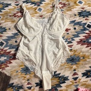 Elegant White Lace Bodysuit